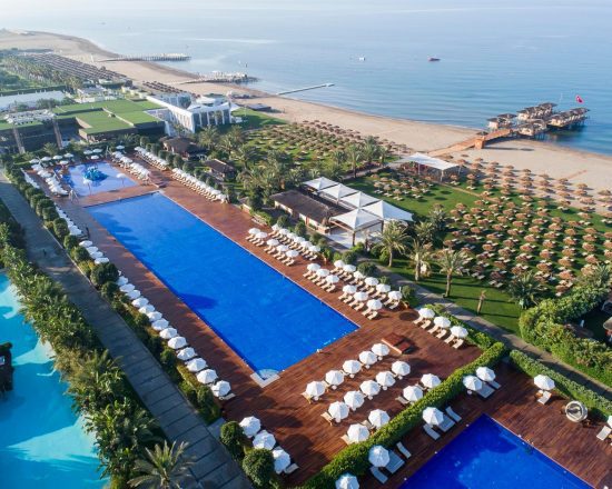 7 nights at Maxx Royal Hotel all inclusive with 4 Green Fees per person (GC 3 at Montgomerie and 1 at Kaya)